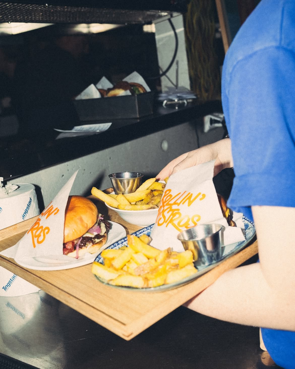 Burgers and fries leaving the Rollin Bistros kitchen