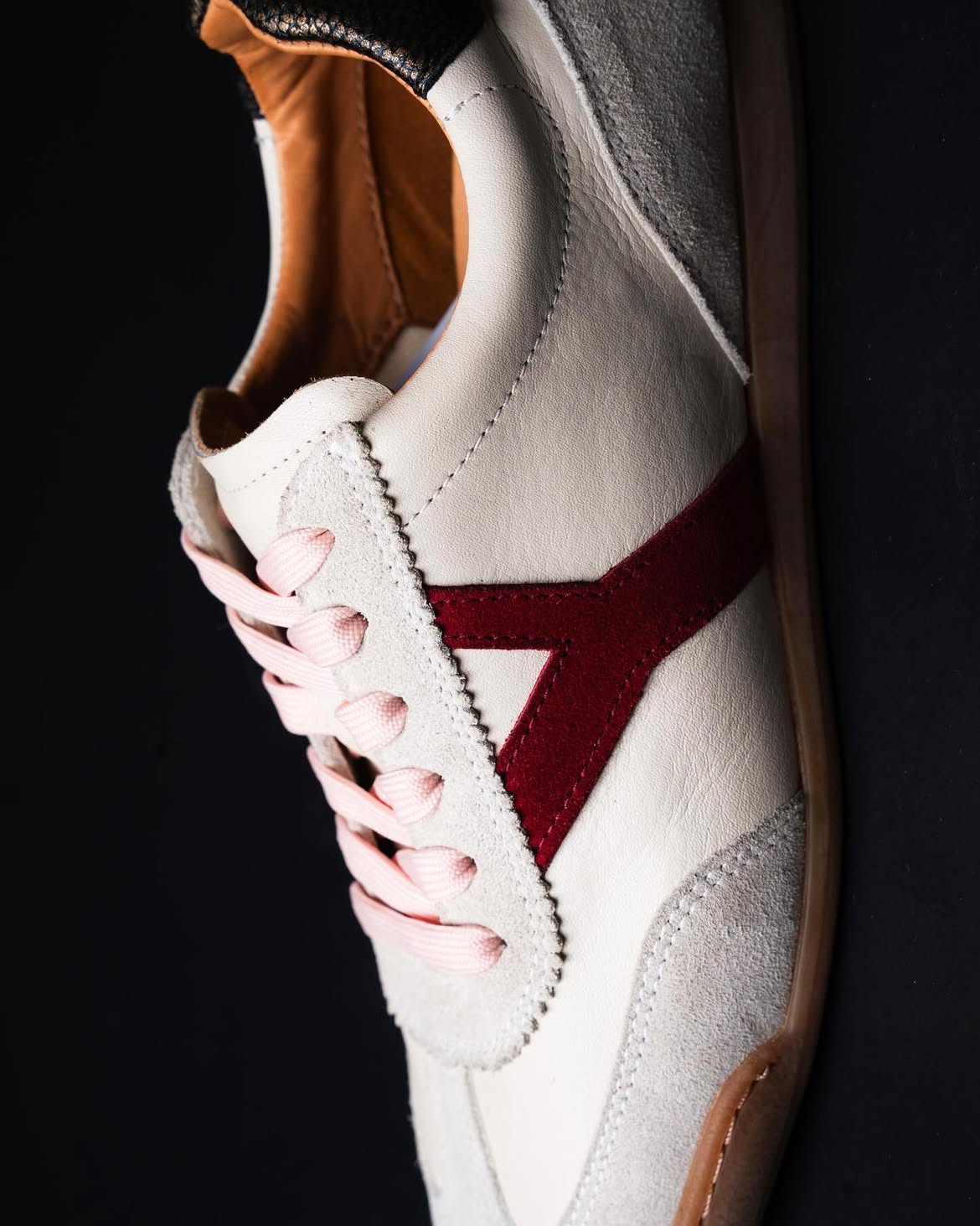 Close-up of a Sneaky Steve Milwaukee Slim Suede sneaker