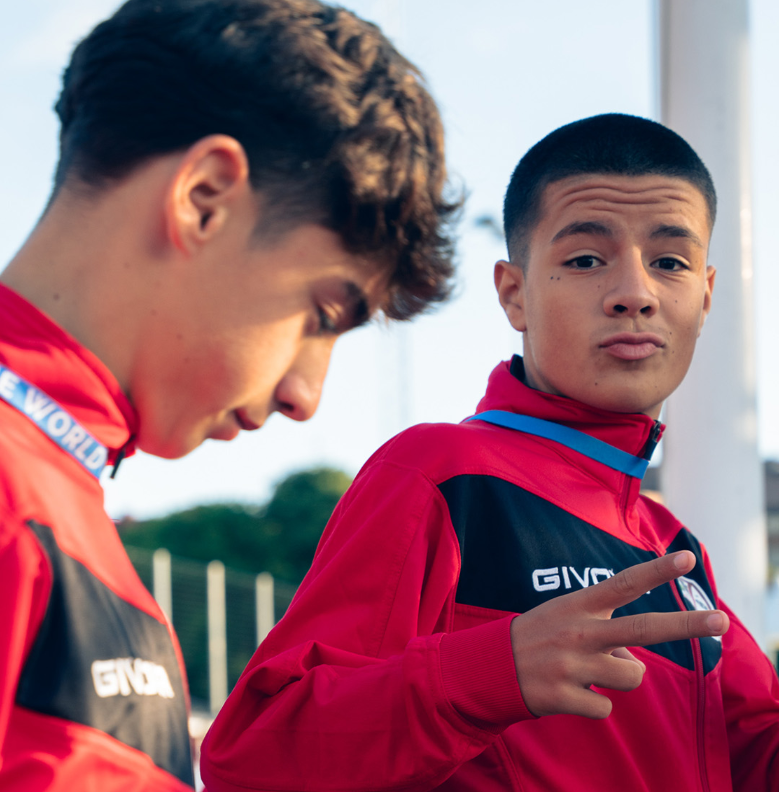 Two young Gothia Cup players in red