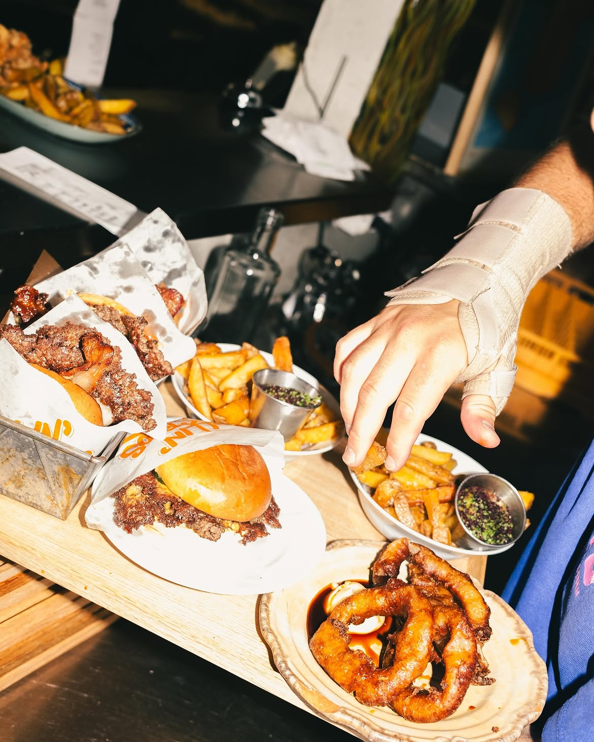 Burgers, fries and grilled octopus at Rollin Bistros